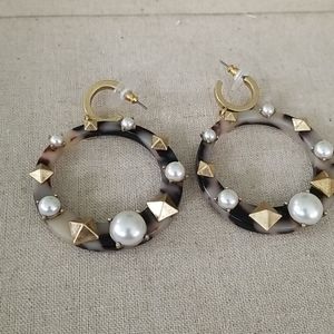 Edgy statement earrings